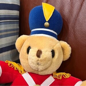 Golden Bear Co Plush Toy with Blue and Red Marching Band Outfit